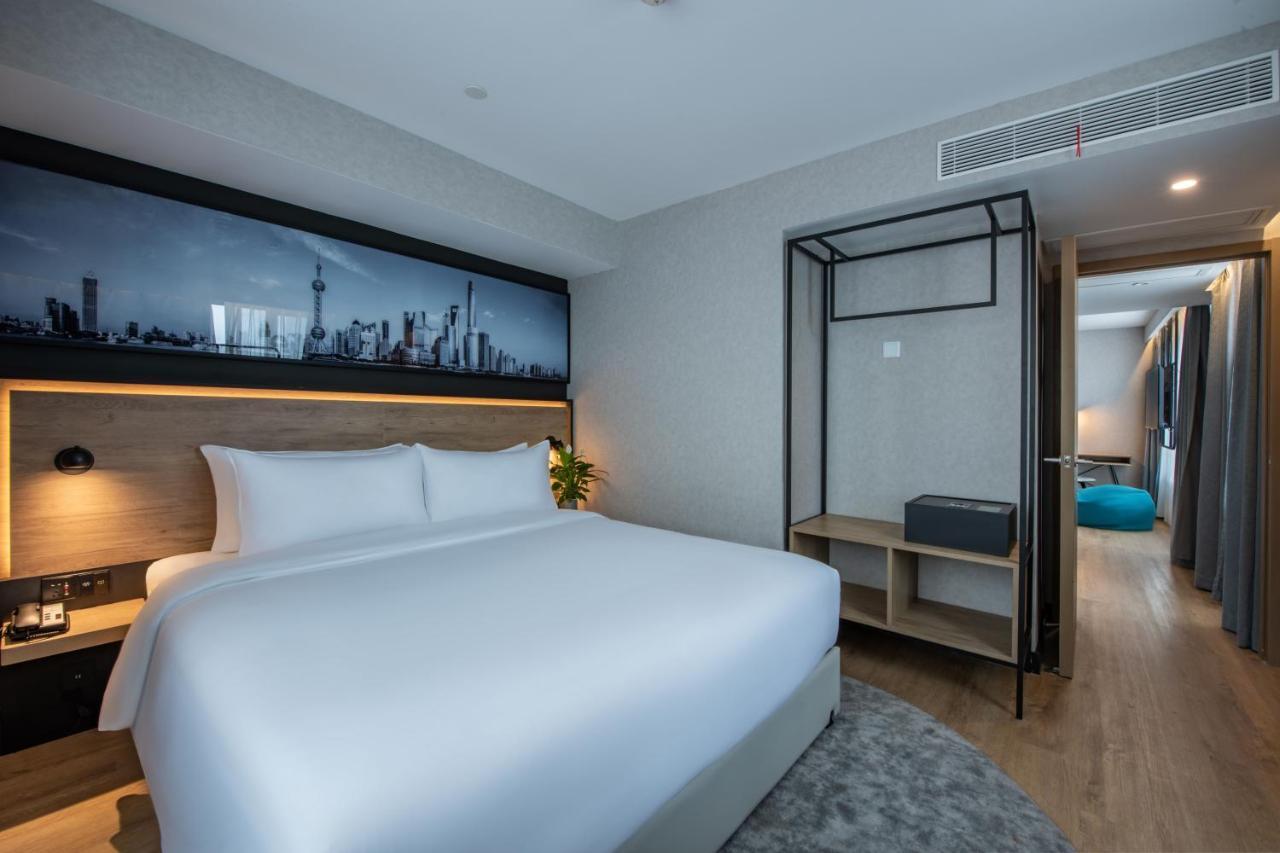 Park Inn By Radisson Shanghai Huanqiugang Esterno foto
