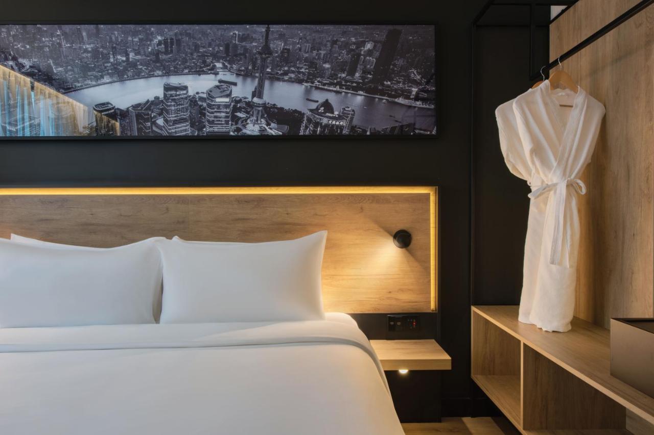 Park Inn By Radisson Shanghai Huanqiugang Esterno foto
