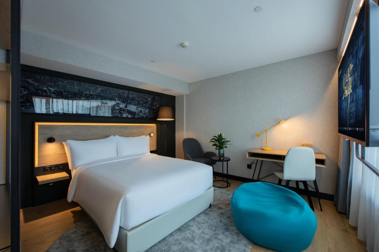 Park Inn By Radisson Shanghai Huanqiugang Esterno foto