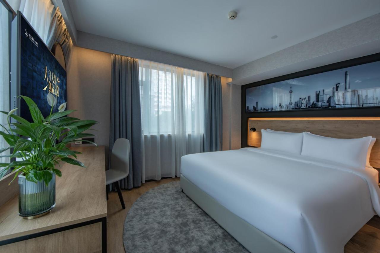 Park Inn By Radisson Shanghai Huanqiugang Esterno foto