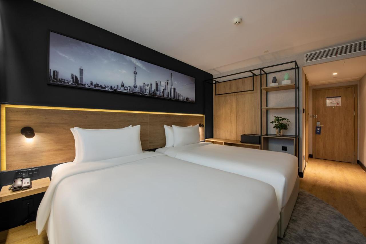 Park Inn By Radisson Shanghai Huanqiugang Esterno foto
