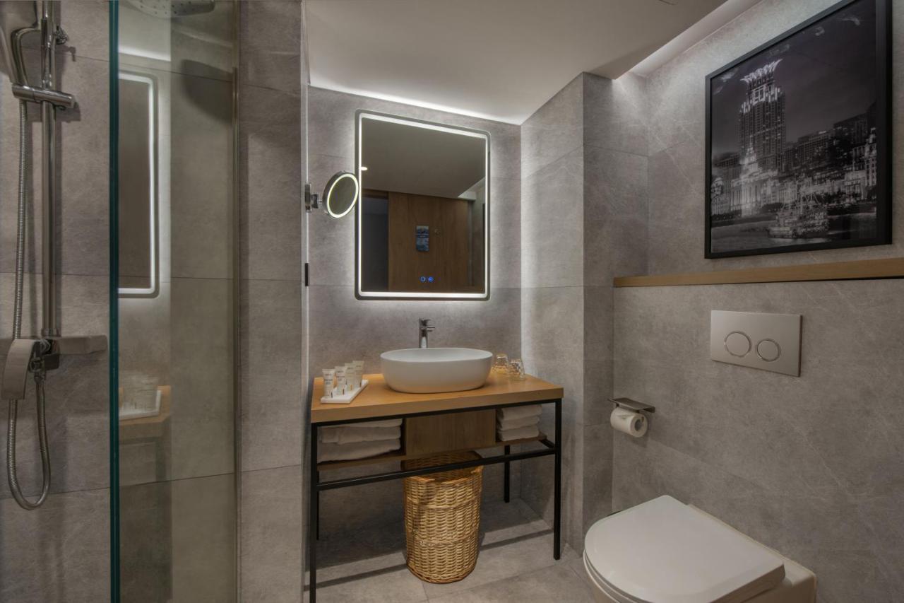 Park Inn By Radisson Shanghai Huanqiugang Esterno foto