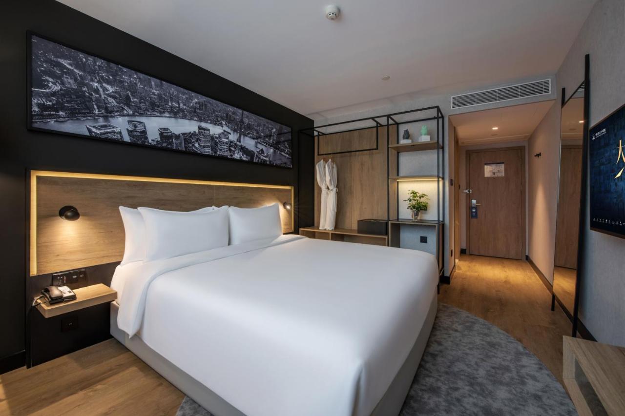 Park Inn By Radisson Shanghai Huanqiugang Esterno foto